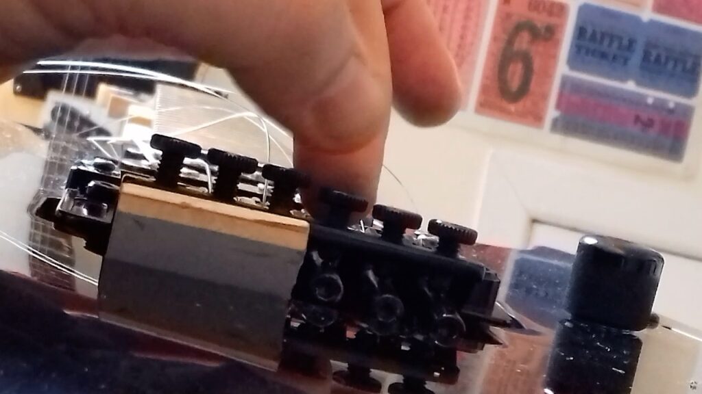 Guitar setup – adjusting the bridge saddles