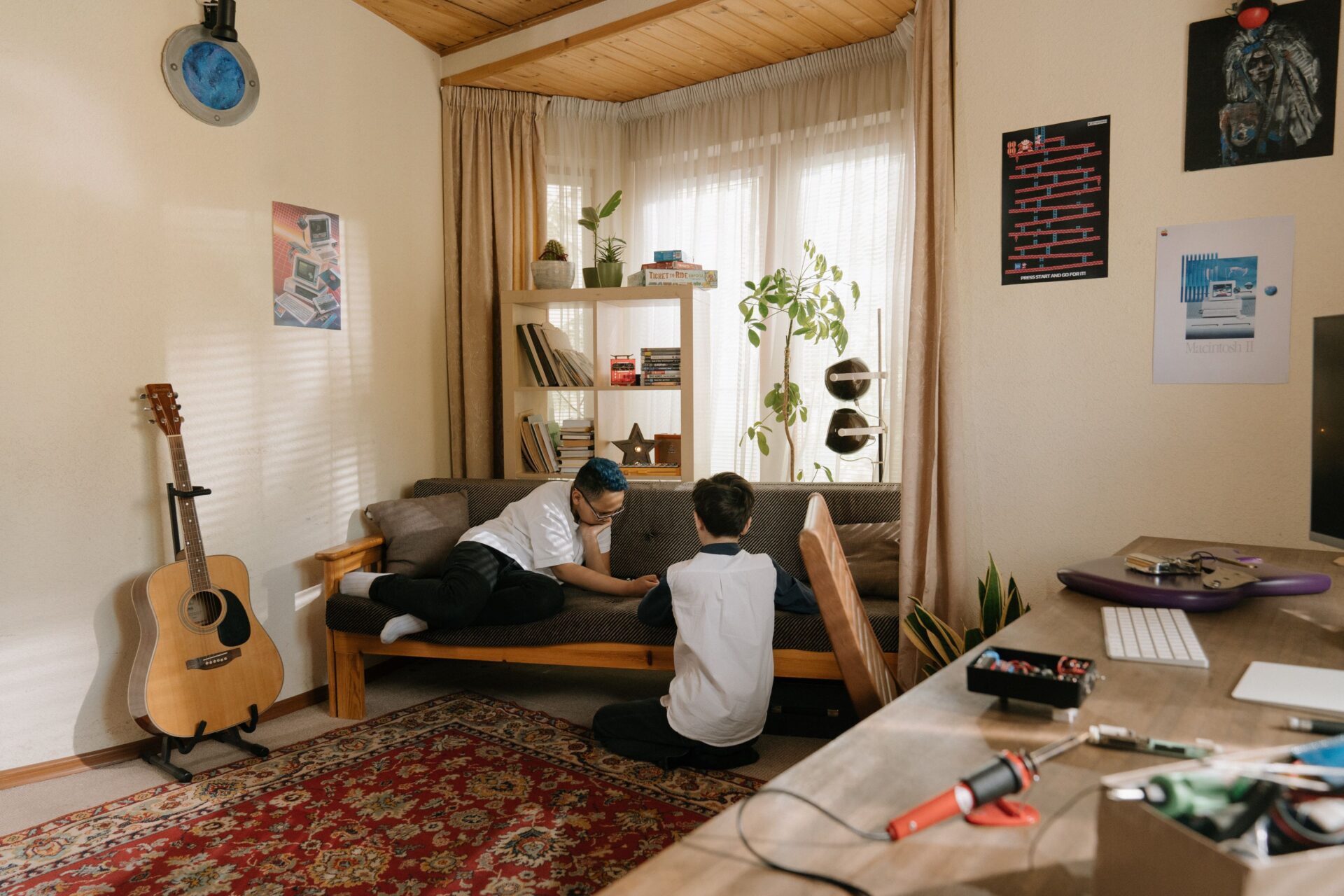Two children relaxing at home together